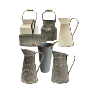 Collection of hand crafted sheet metal jugs