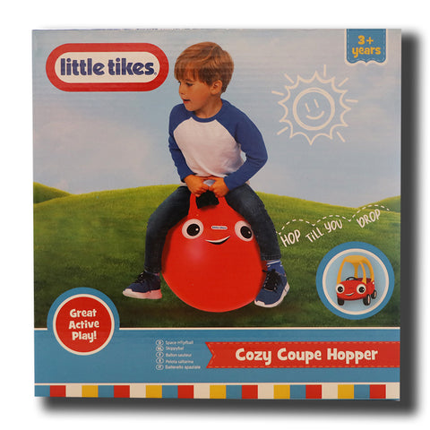 Child playing on a space hopper